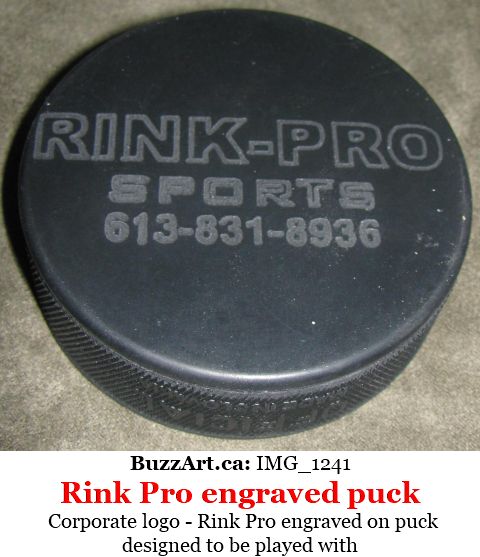 Company logo Rink-Pro engraved on hockey puck